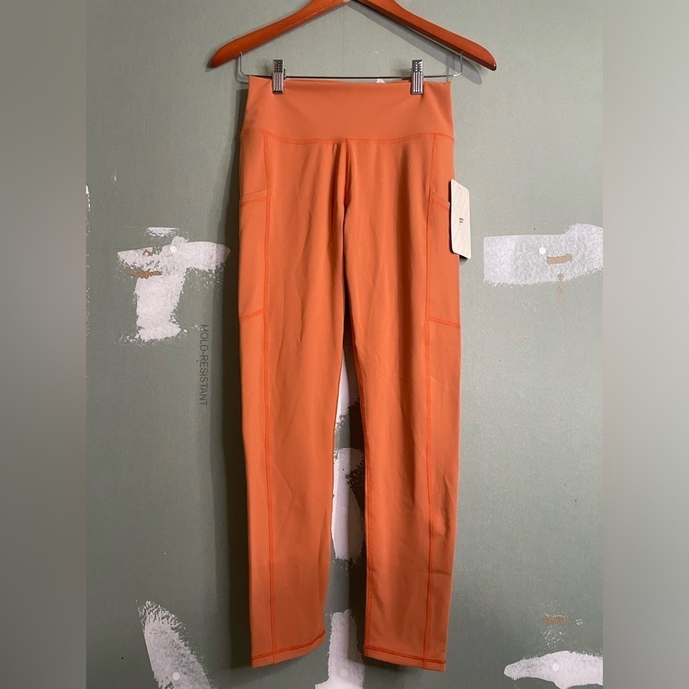 NWT Fabletics High Waisted Side Pocket 7/8 Leggings in Rust Orange